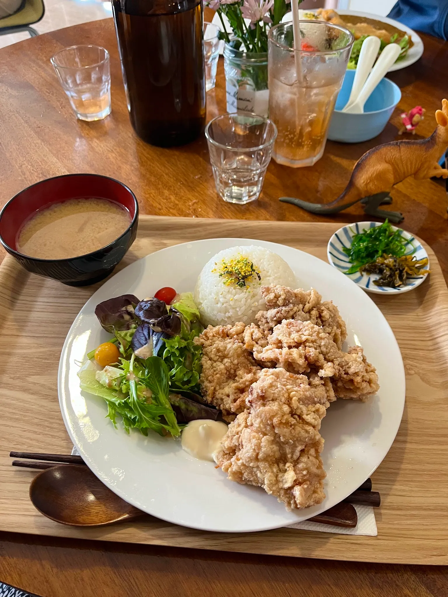 Karaage chicken teishoku set with rice, salad and miso soup on timber table